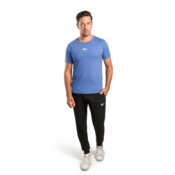 Athlete wearing JDM ACTIVE men’s black performance activewear pants.